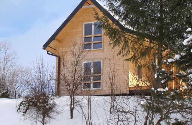 Domek nad stawem