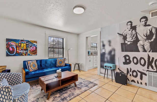 Downtown Blue Bungalow w/Fully Fenced Yard, AC, W/D, 3 Smart TVs, Den, Fast WiFi