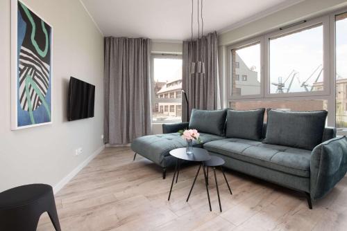 Elegancki Apartament Blisko Rzeki w Gdańsku z Parkingiem by Noclegi Renters