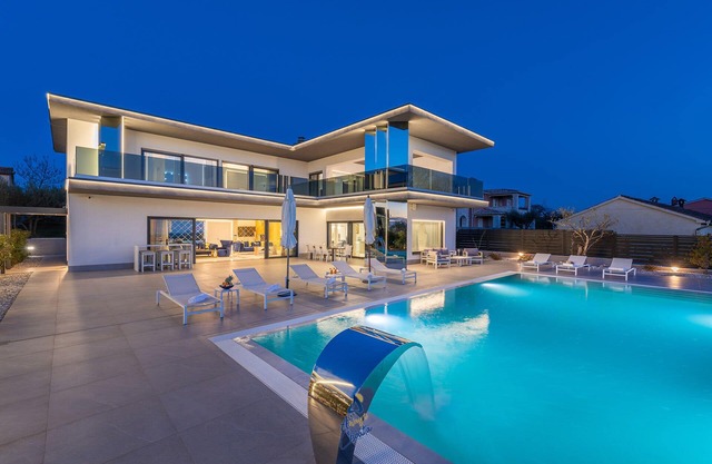 Elegant 5-BR Villa with Heated Saltwater Pool & Chic Interiors Near the Coast