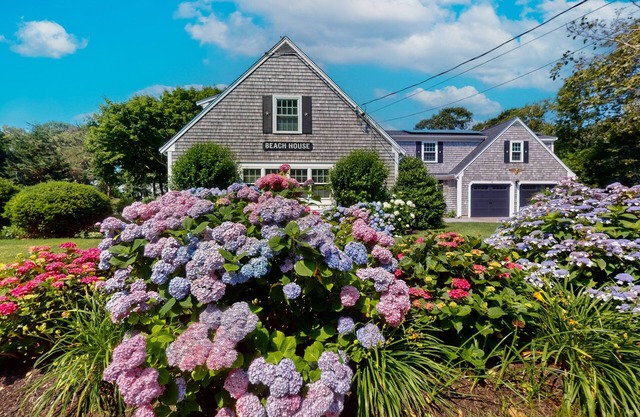 Elegant estate with large deck and lush yard - walk to beach on Nantucket Sound