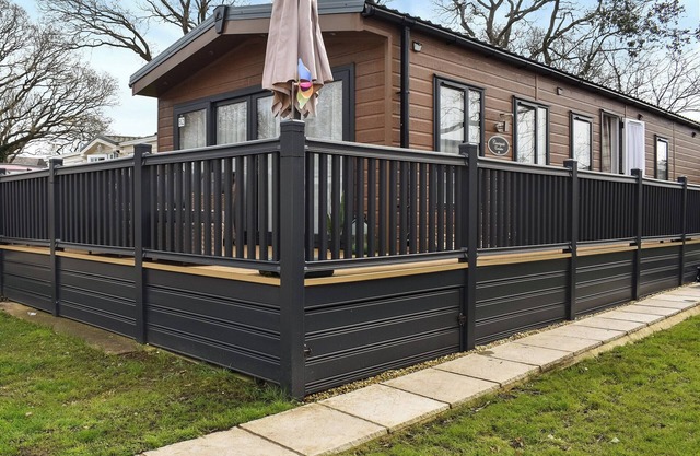 Enjoy a coastal escape in a two-bedroom lodge on a holiday park near the beach.