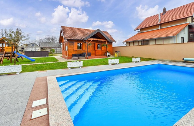 Enjoy a fantastic view of the countryside in this inviting vacation home with pool!