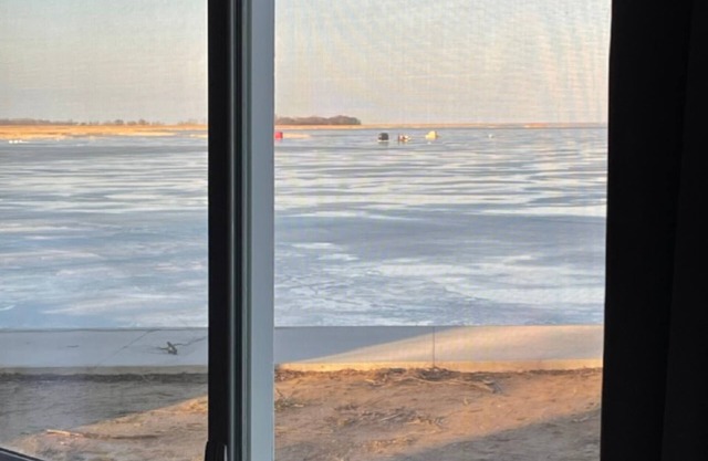 Enjoy a panoramic view from a private home on the water