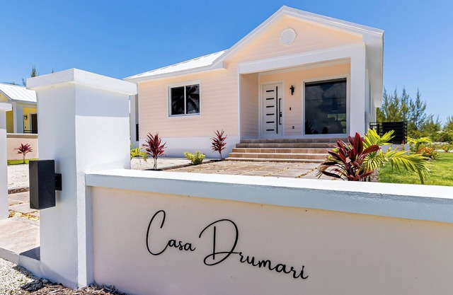 Enjoy a peaceful stay in this elegant 3 bed & 3 bath home steps from the beach.