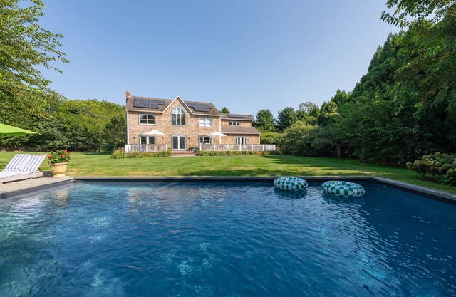 Enjoy Beautiful Sunsets Over Farm Fields From The Back Deck Of This Beach Home