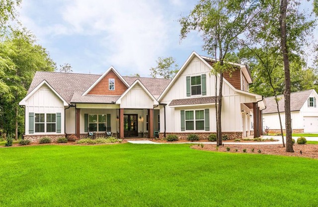 Enjoy this large southern dream home on beautiful lot with Pecan trees.