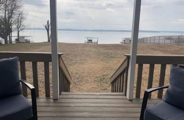 Enjoy this SPECTACULAR VIEW of Lake Wheeler from our beautiful 4 bedroom home!