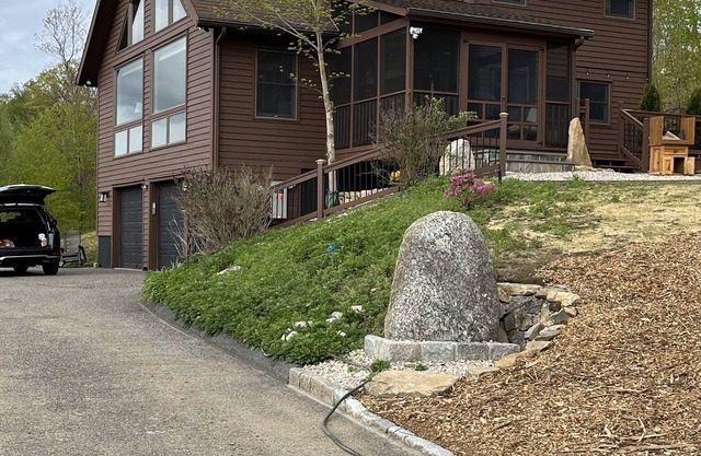 Escape to a one-of-a-kind Mountaintop Retreat with panoramic westerly views