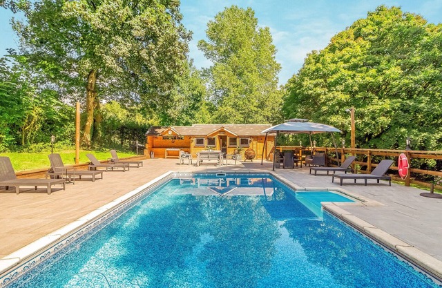 Escape to rustic charm and relaxation at this one-bedroom log cabin near Cowbridge.