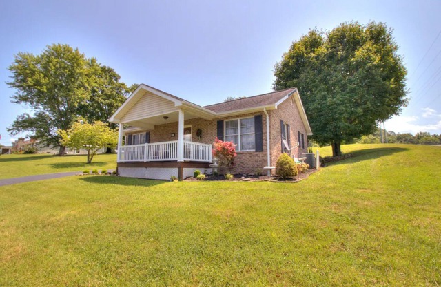 Experience the serenity of a peaceful neighborhood and the excitement of the city .