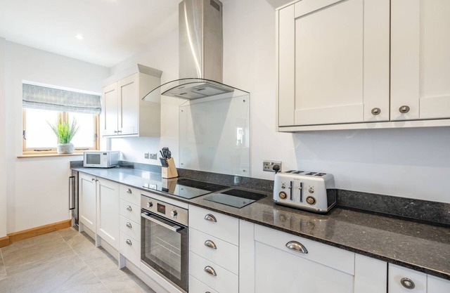 Fabulous, detached barn sleeping eight, with four bedrooms and four bathrooms.