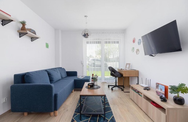 Family Apartment with Parking & Terrace by Noclegi Renters