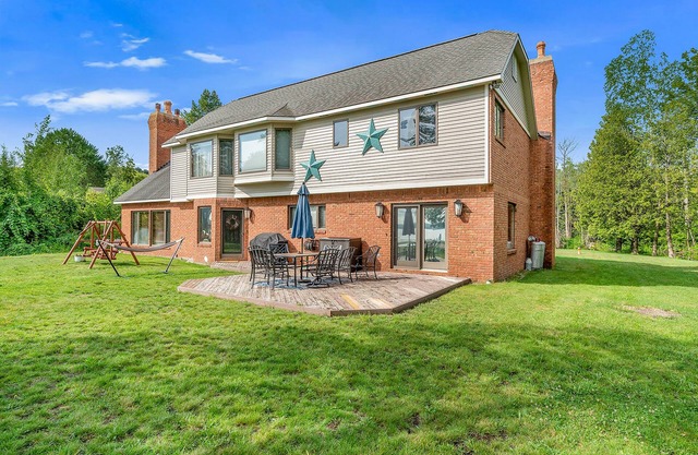 Family-Friendly Lake View Home with Patio, Grill, Deck, Fireplace, & Free WiFi