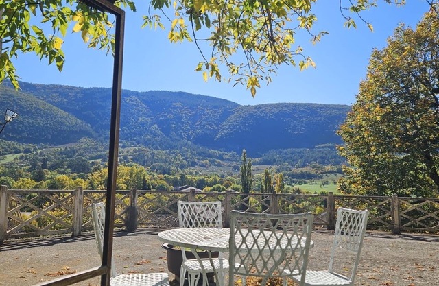 Family home in village center with private garden