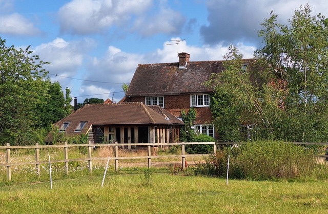 Farm in Quiet Hamlet with horse and sheep