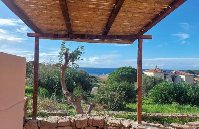 Flat with sea view terrace in holiday village near Isola Rossa