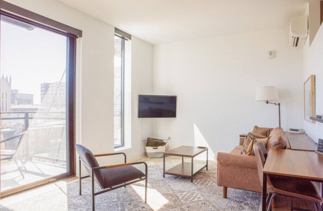 Flexhome East Side 1BR Apt with Balcony, Pool, and Gym