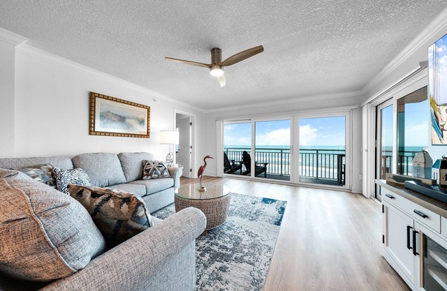 Fully renovated direct oceanfront condo with a large balcony, heated pool and beach access