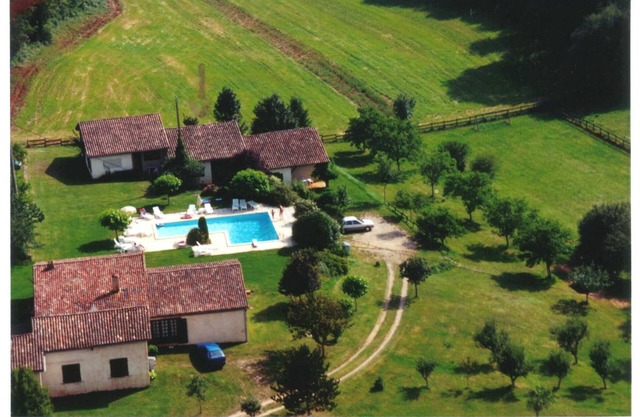 Gite with large swimming pool, play area, green space.