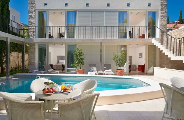 Golden Beach Villa - waterfront villa with a pool for 16 guests