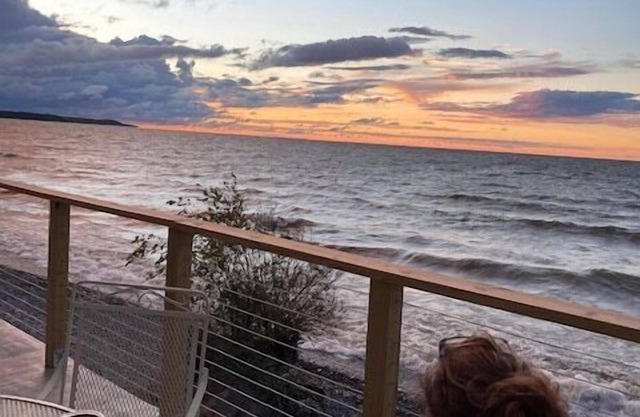 Gorgeous 5 bedroom lakefront home with huge yard and 300ft of beachfront