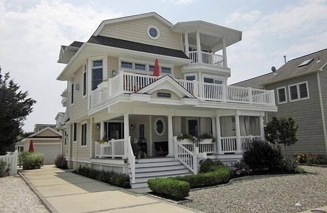 GORGEOUS BEACH BLOCK CUSTOM 3 STORY CONTEMPORARY HOME w/PRIVATE IN-GROUND HEATED POOL!