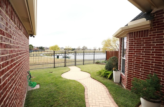 Gorgeous View Home backing up Community LAKES & Trail