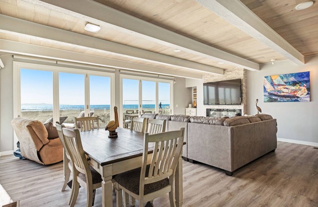 Gorgeous waterfront home with a private hot tub, gas fireplace, & beach access