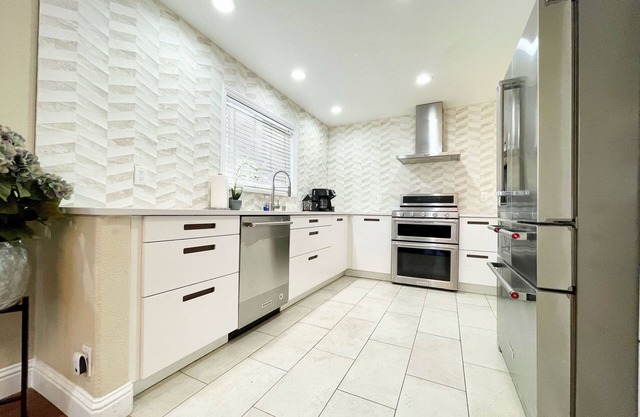 Gourmet Kitchen + Private Front Yard + Parking