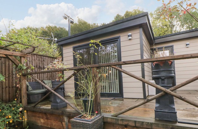 GREEN LODGE, with a garden in Greenfield