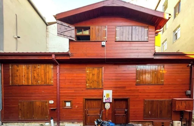 Historical Wooden House in Center of City