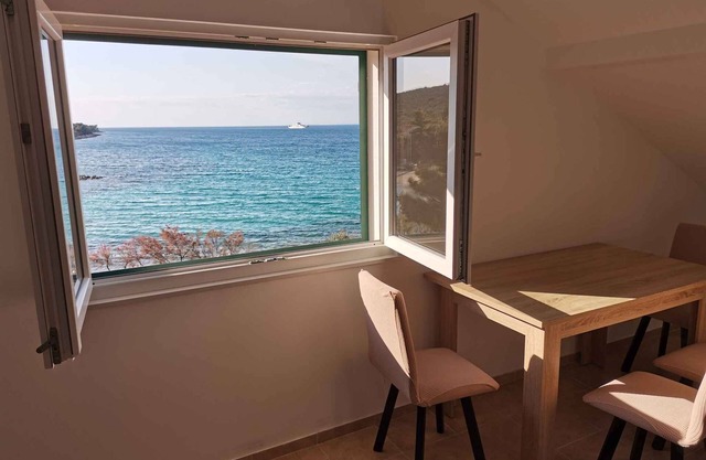 Holiday apartment by the sea with a large terrace