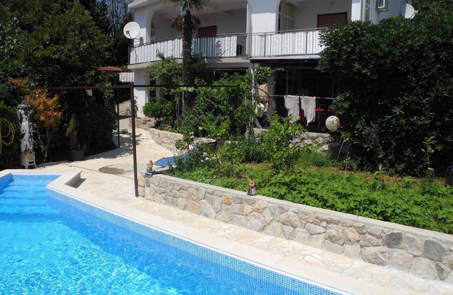 Holiday apartment with outdoor pool just 30 meters from the beach