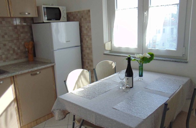 Holiday apartment with balcony and air conditioning