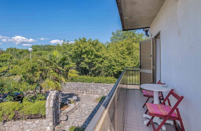 Holiday apartment with balcony and air conditioning