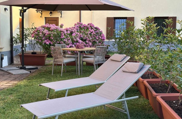 Holiday home with garden and air conditioning