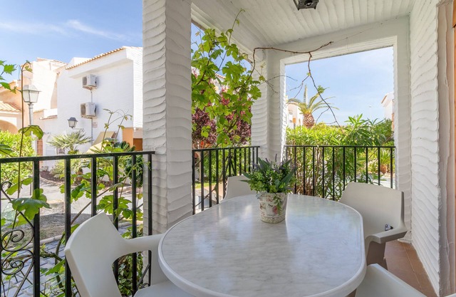 Holiday Home 'Casa en la playa con piscinas E' with Shared Pool, Wi-Fi and Air Conditioning