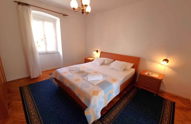 Holiday home with air conditioning and grill