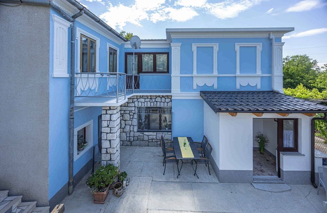 Holiday home with large terrace and air conditioning