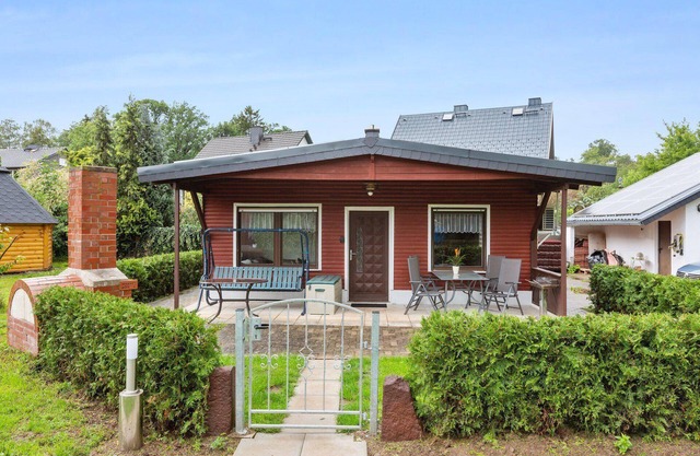 Holiday home with natural swimming pond