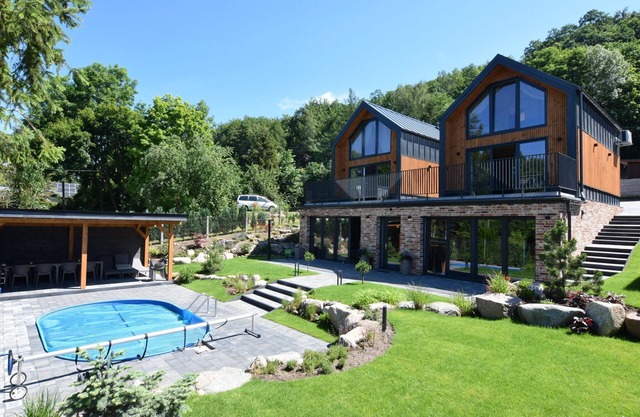 Holiday home with pool and sauna