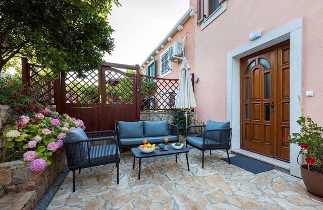 Holiday home with terrace and barbecue