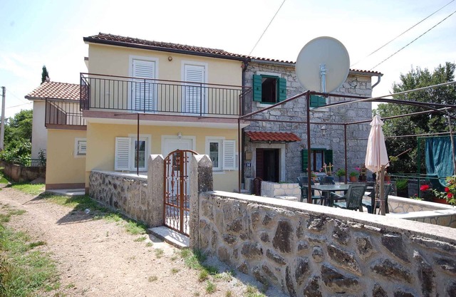 Holiday home with terrace and barbecue