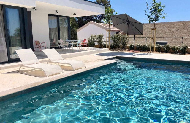 Holiday home with terrace and pool