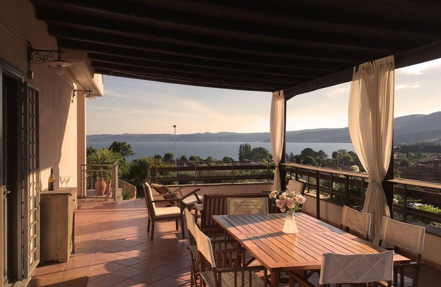 House with large terrace, garden and wonderful view on the lake