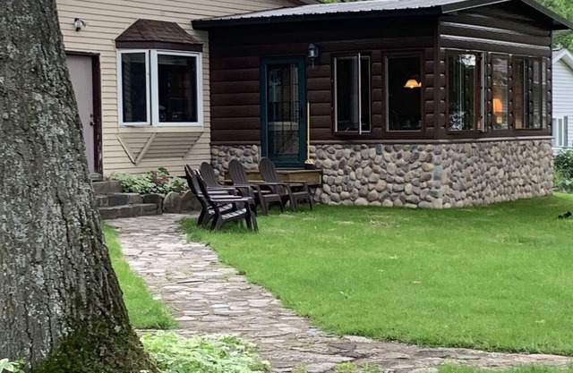 Hubbard Lake West Shore Lakefront Cottage with stunning view