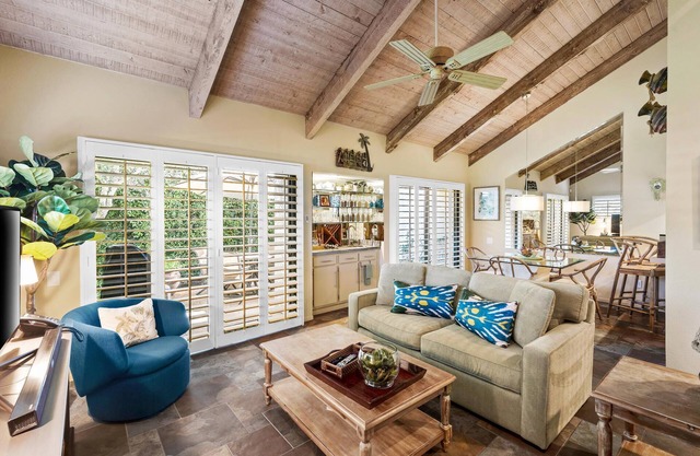 Immaculate Mission Hills tennis villa with mountain views from private roof deck