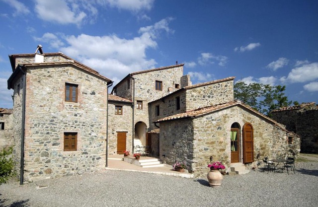 In a wonderful medieval village on the Tuscan hills, with air conditioning