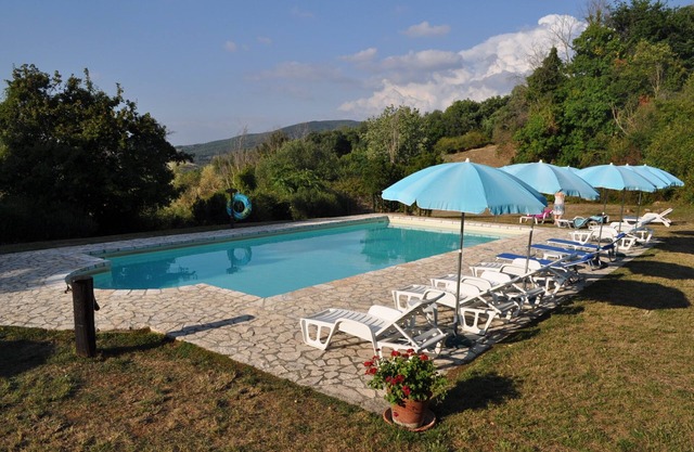 Independent panoramic cottage in active farmhouse with shared pool Tuscany Siena